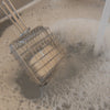 Heaven In Earth Soap Shaker Cage creating suds in basin